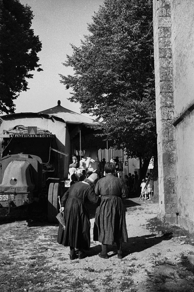 Women going to a fun fair, 1935.