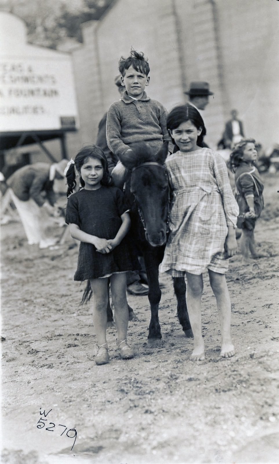 Historical Photos of People Enjoying Donkey Rides on the Beach from the Early 20th Century