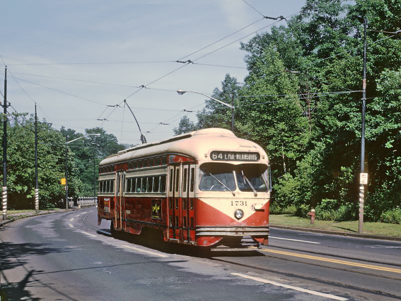 A #64 East Pittsburgh-Willkinsburg car on Forbs Ave. at Frick Park in Pittsburgh, PA on June 26, 1965