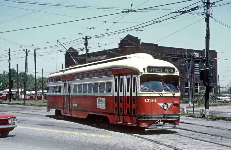 A #10 West View departing Keating Car House and Crossing Perryville Ave. in Pittsburgh, PA on June 26, 1965