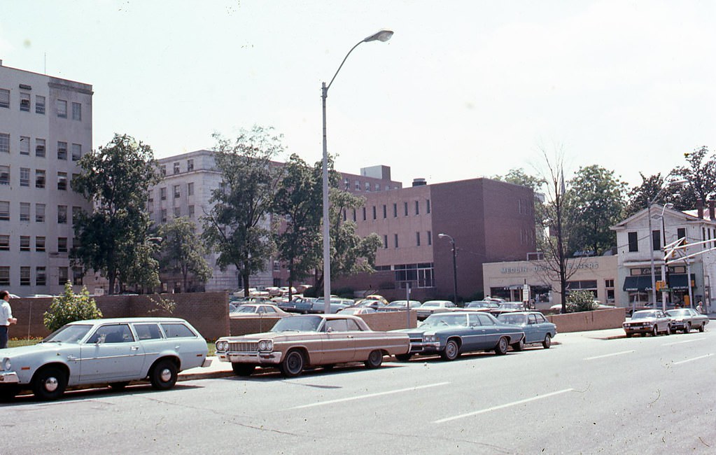 Jones Street, Raleigh near intersection with Salisbury Street. Education building is seen center of frame, 1970s