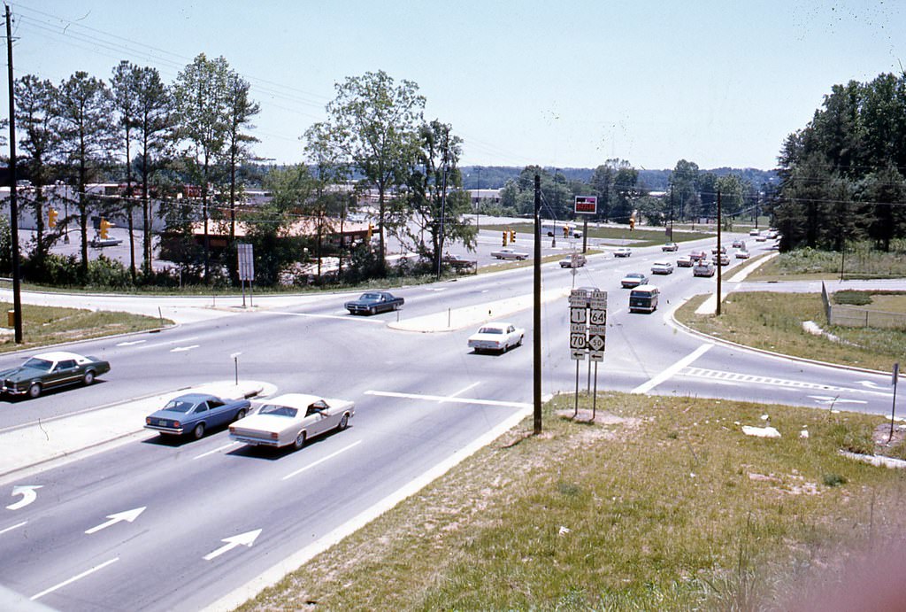 View from Raleigh Beltline overpass looking south down Wake Forest Road toward Holly Park Shopping Center, 1970s