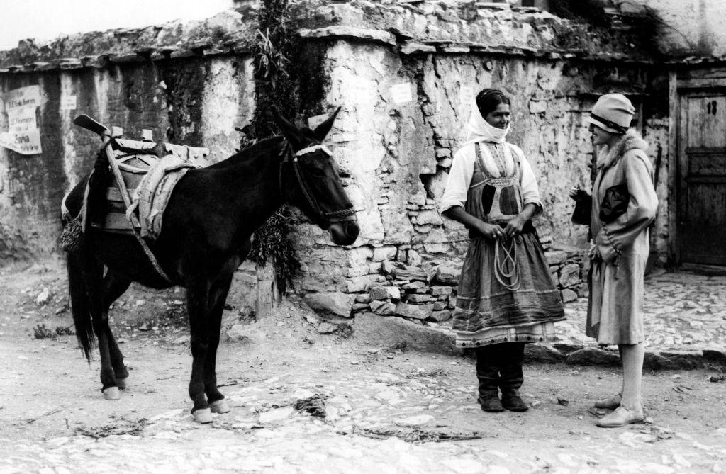 Two women with a horse in Rhodes, 1920s.