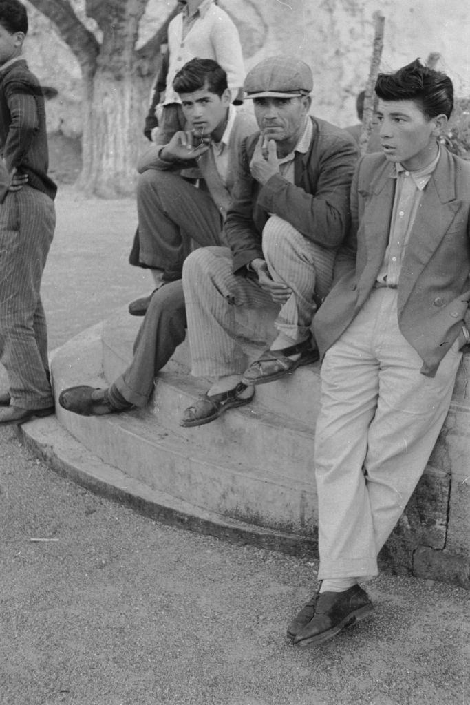 Men sitting in Rhodes, 1954.