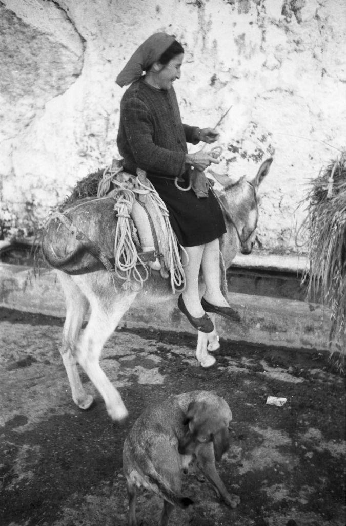 A woman on her donkey in Rhodes, Greece, 1950s.
