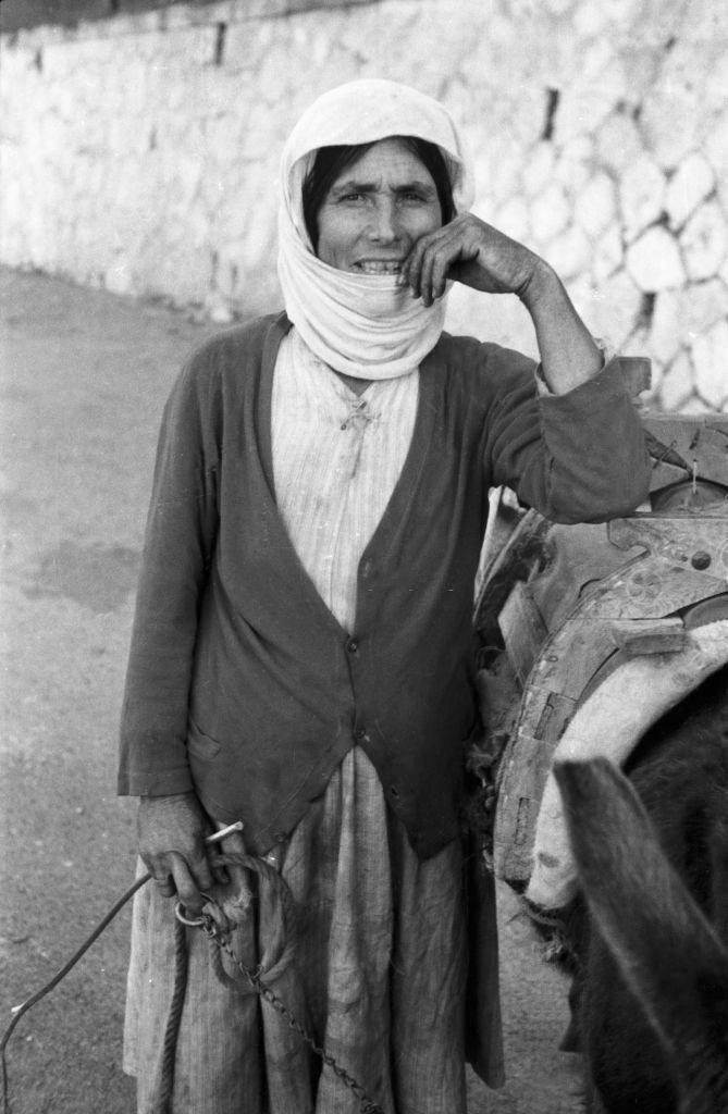 Portrait of a woman with her donkey, Rhodes, Greece, 1950s.