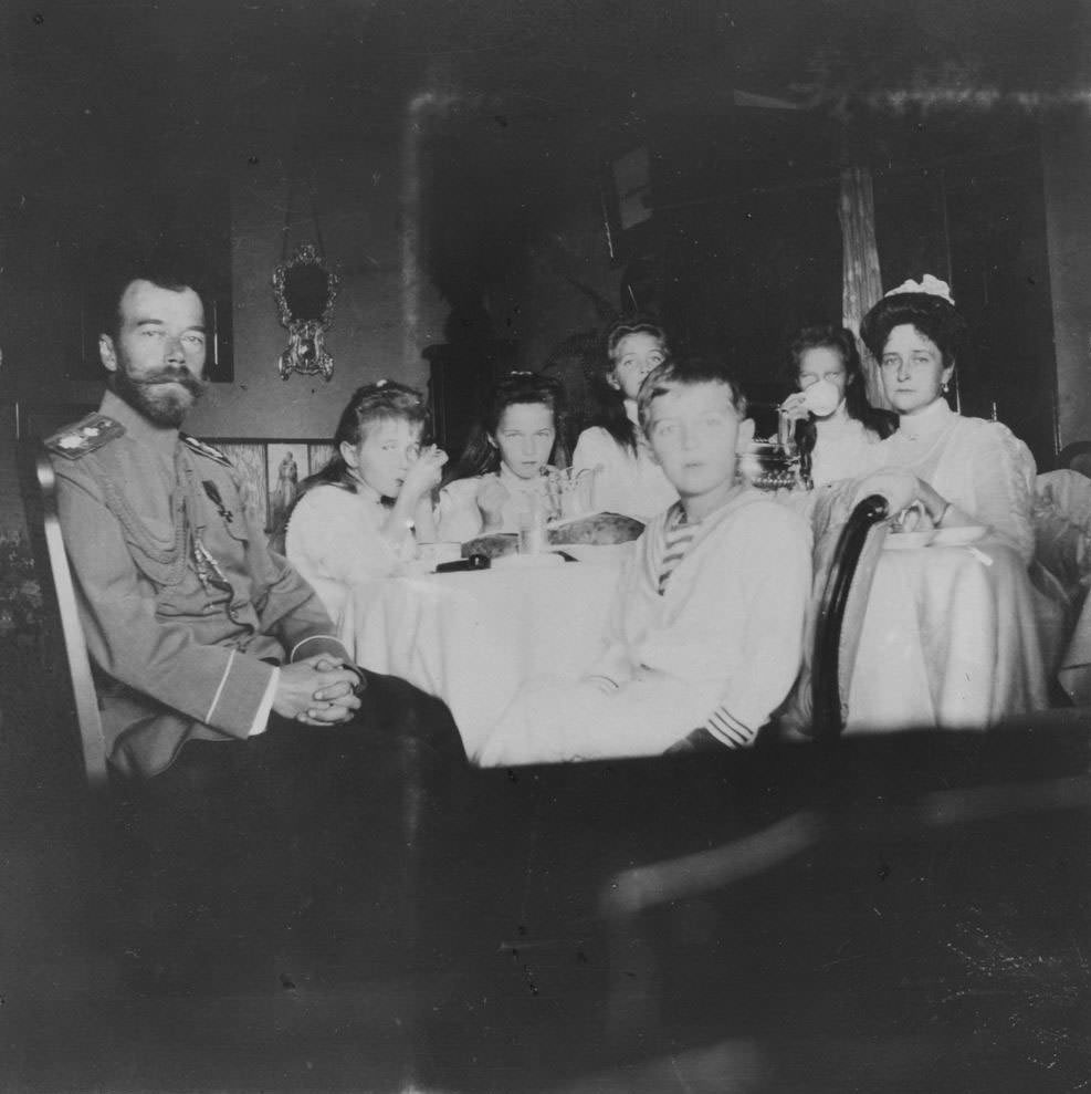 Nicholas II and his wife, Empress Aleksandra (far right), with their four daughters and son.