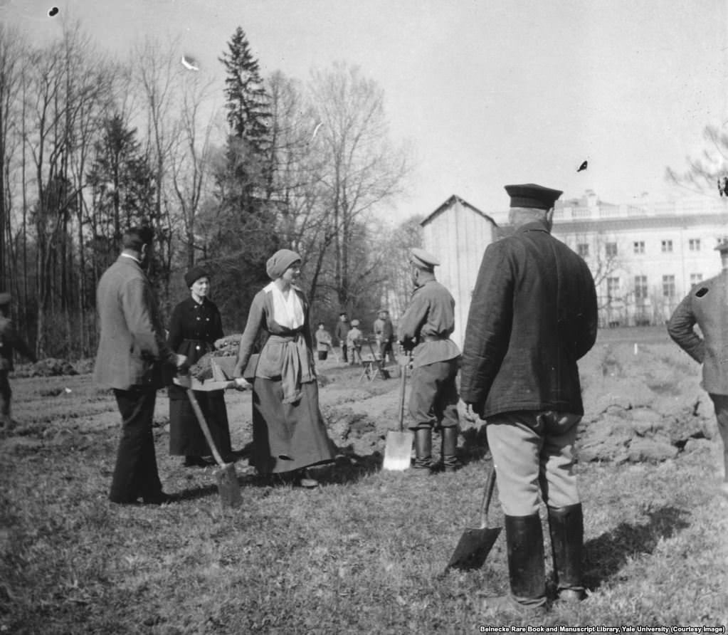 In the months after the 1917 Revolution, Grand Duchess Tatiana helping to dig a vegetable garden while being held in captivity by revolutionaries.