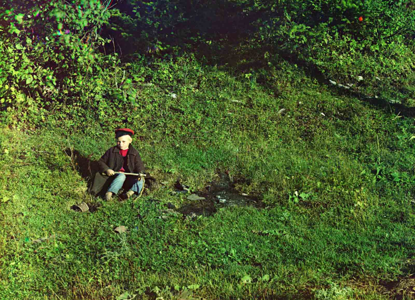 On the Sim River, a shepherd boy. Photo was taken in 1910, from the album “Views in the Ural Mountains, a survey of an industrial area, Russian Empire”.