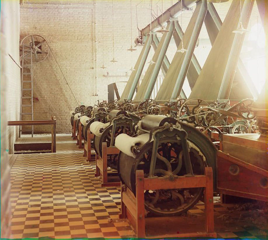 Cotton textile mill interior with machines producing cotton thread, Tashkent, ca. 1910s