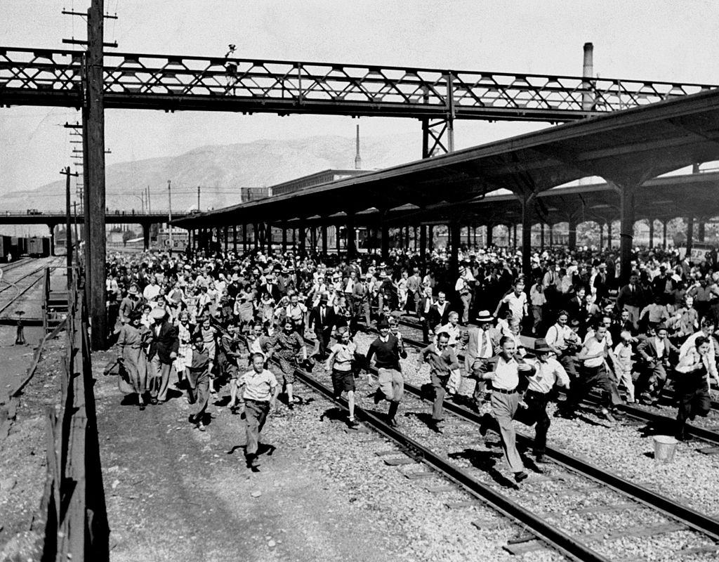 Crowd rushes to see President Franklin D. Roosevelt on his stop in Salt Lake City, 1935.