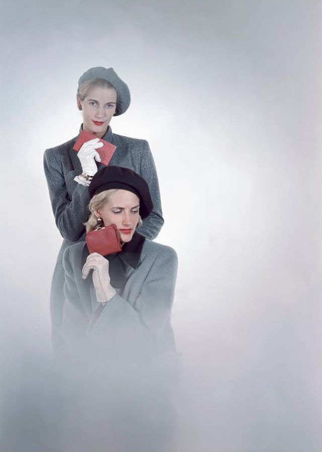 Models one standing holding a cigarette case, the other holding red Morocco purse, both wear white hand-stitched pig skin gloves, Glamour, 1946