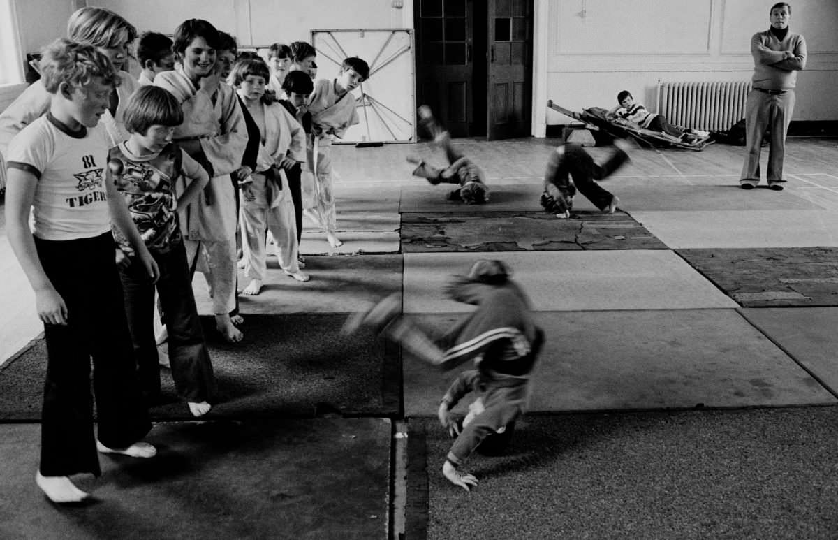 Kids learning martial arts in a local gym, Catholic Derry, 1978