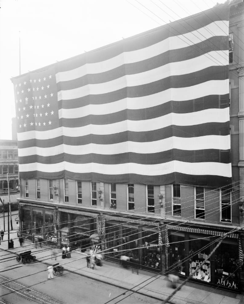 Daniels & Fisher bldg., huge flag, 1896.