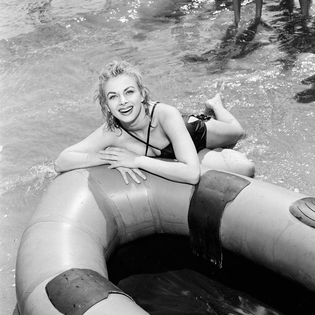 Italian actress Sandra Milo after a dunking in the Adriatic at 1956 Venice Film Festival.