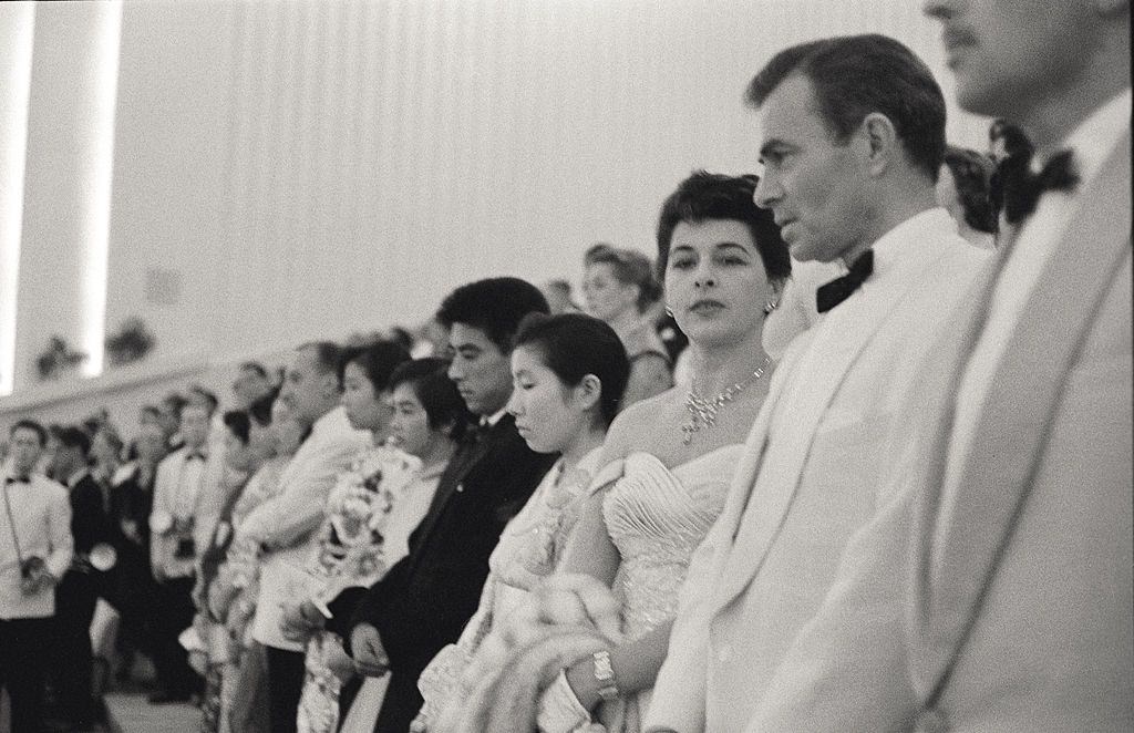 James Mason and Pamela Kellino take part in XVII Venice International Film FestivalJames Mason and Pamela Kellino take part in XVII Venice International Film Festival, they both stand in the stalls with other celebrities.