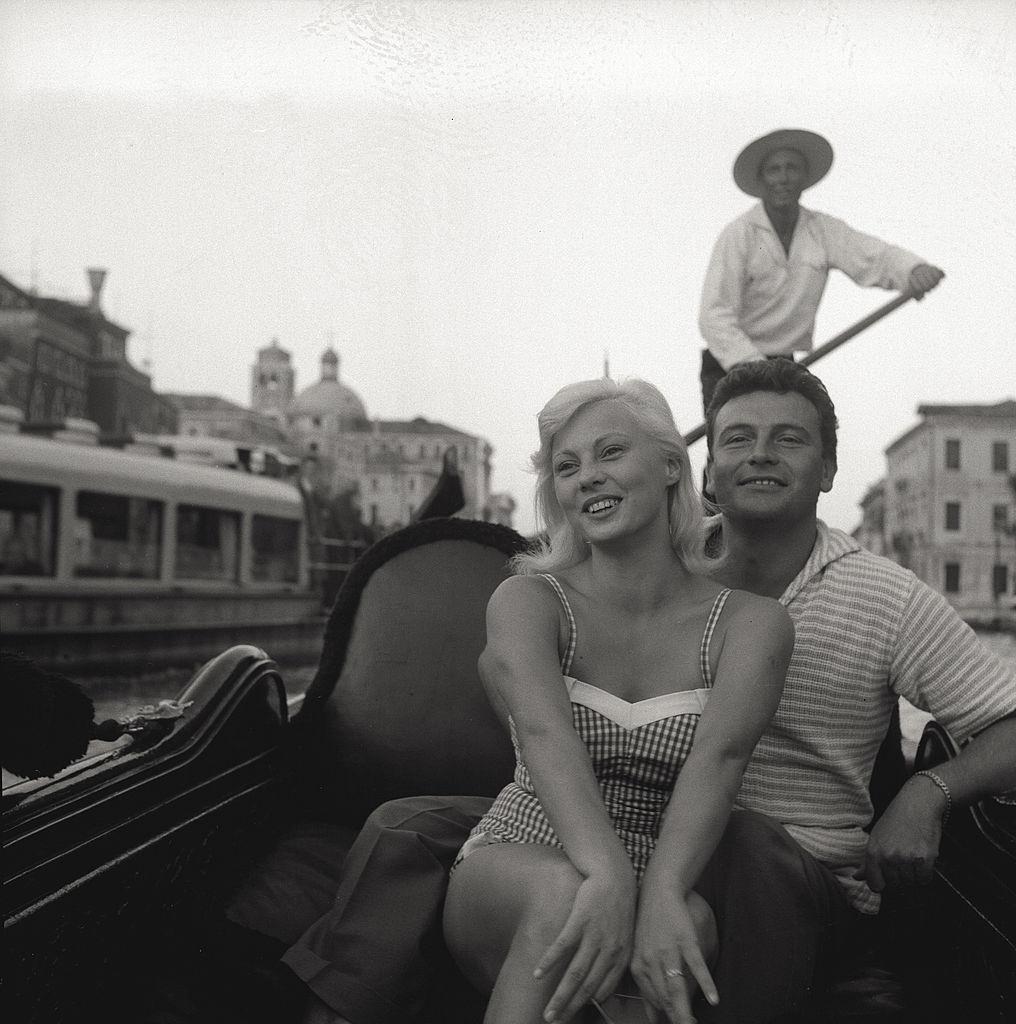 Celebrities take a stroll on a gondola in Venice, during the 17th Venice Intenational Film Festival.