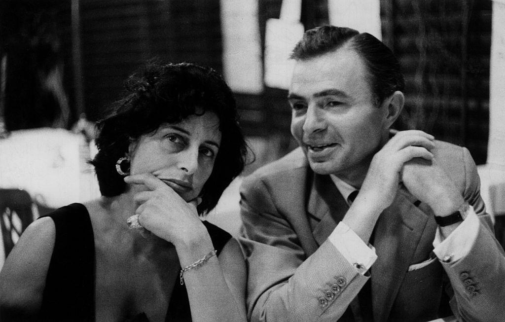 Actors Anna Magnani and James Mason having dinner in an inn during the 17th Venice International Film Festival.