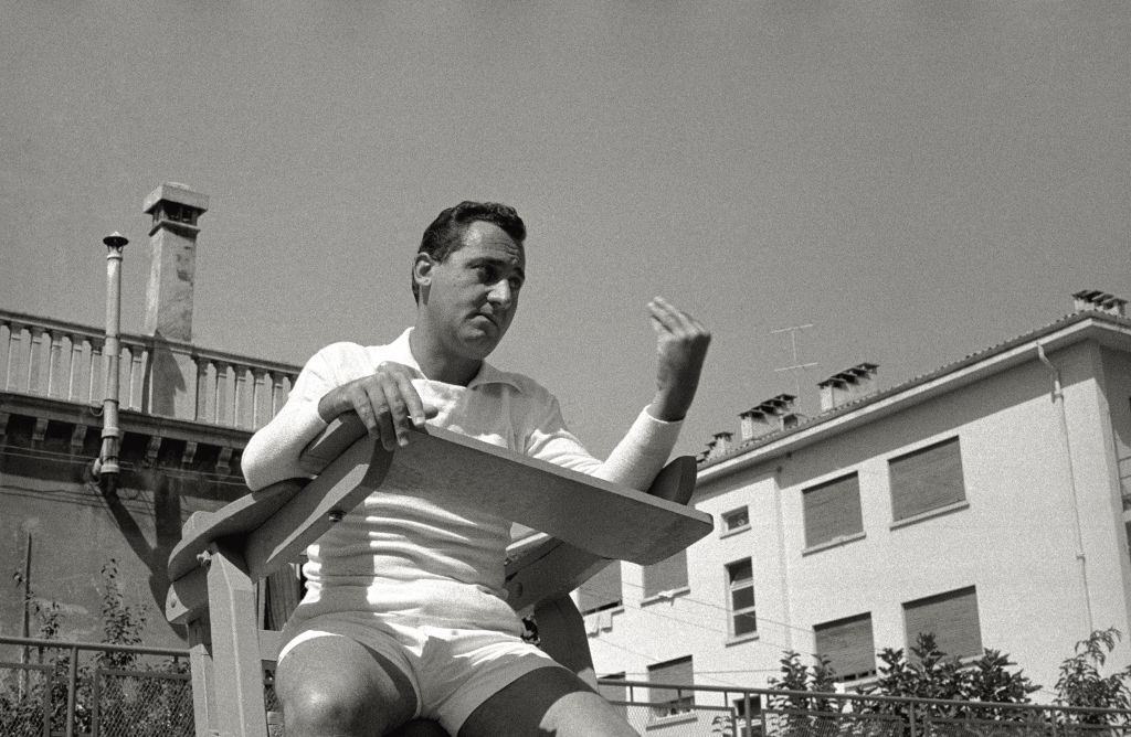 The actor Alberto Sordi makes a pretence of being umpire, sitting on the chair of the competition director, during the 17th Venice Intenational Film Festival.