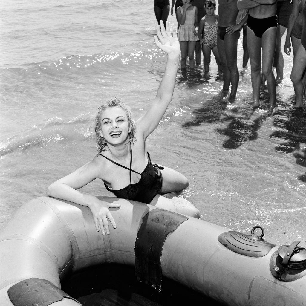 Italian actress Sandra Milo after a dunking in the Adriatic at 1956 Venice Film Festival.