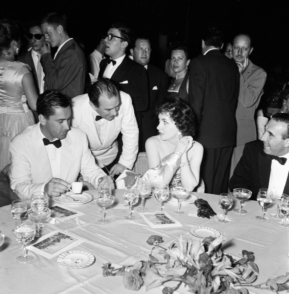 Italian actress Gina Lollobrigida, speaking with Bernard McElwaine Sunday Pictorial Journalist.