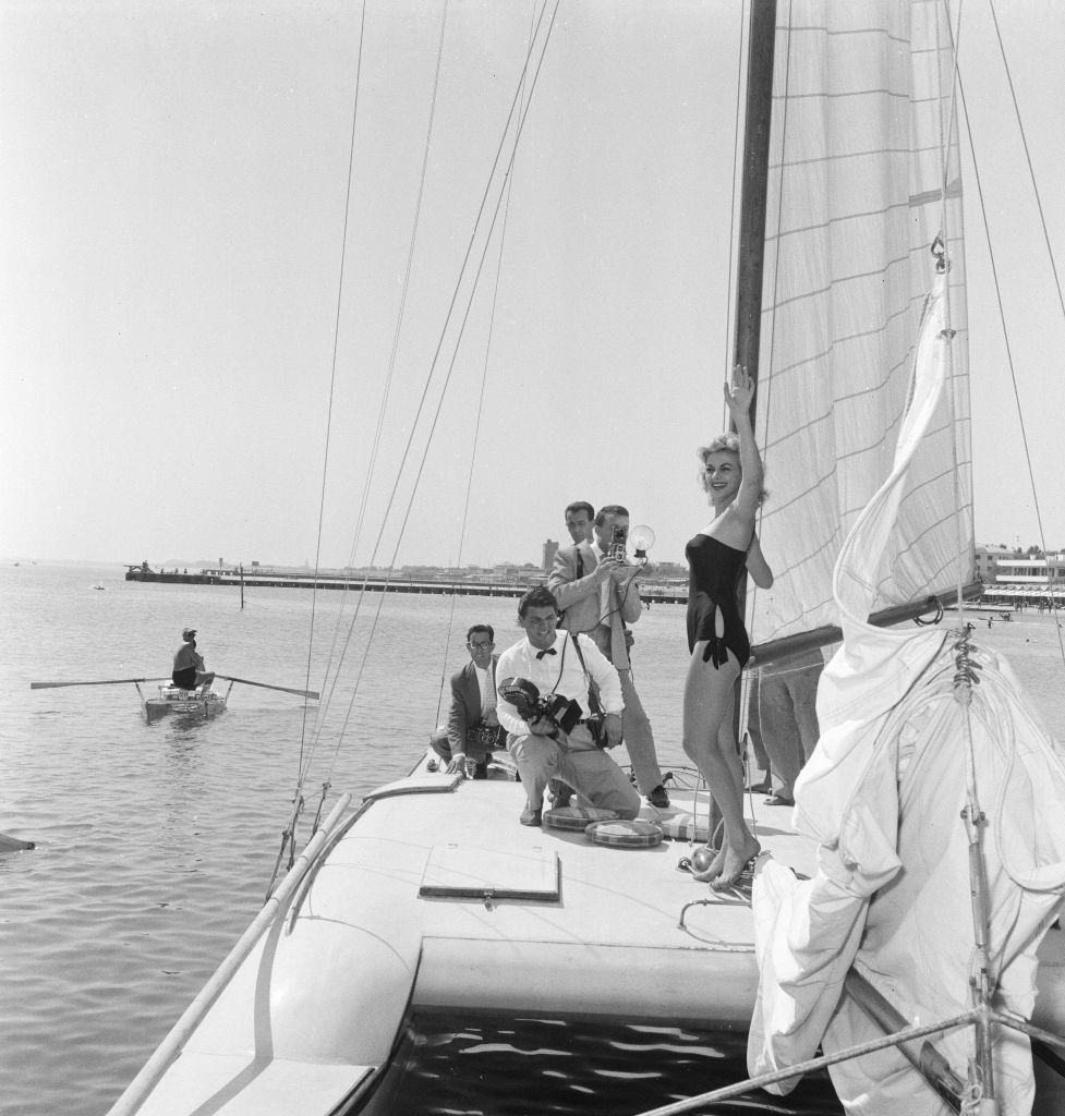 Italian actress Sandra Milo poses for pictures on a Catamaran.