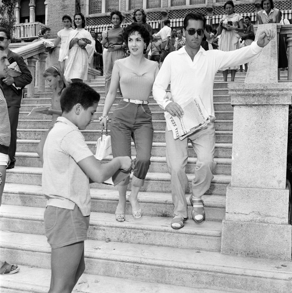 Italian actress Gina Lollobrigida, with her husband Milko Skofic at 1956 Venice Film Festival.