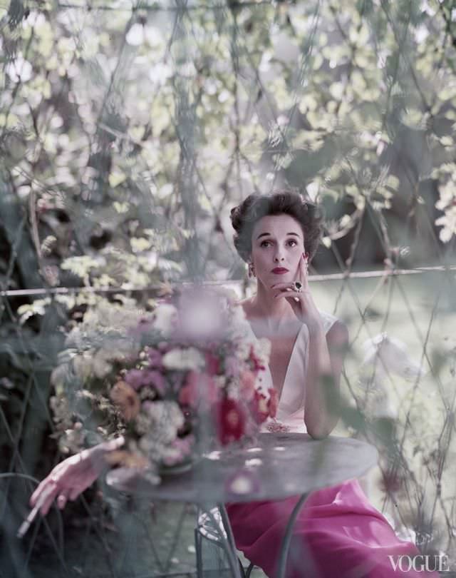 Babe Paley at her Kiluna Farm home in Manhasset, Long Island, in a Mainbocher evening dress, December 1, 1952