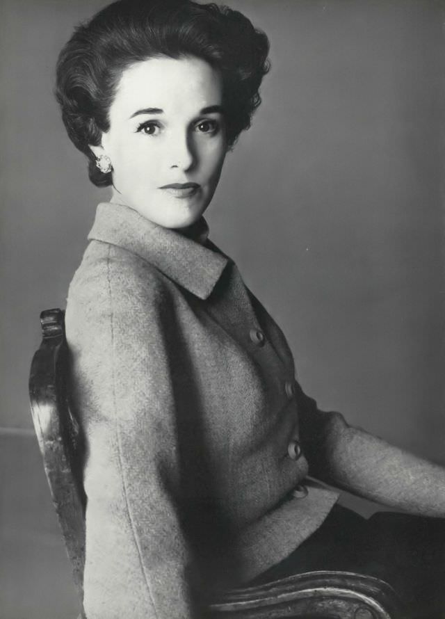 Babe Paley in pale blue tweed jacket over a navy-blue skirt by Mainbocher, March 15, 1954