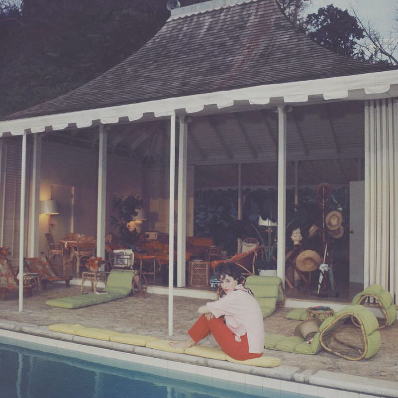 Babe Paley beside the pool at Round Hill, her villa in Jamaica, 1959