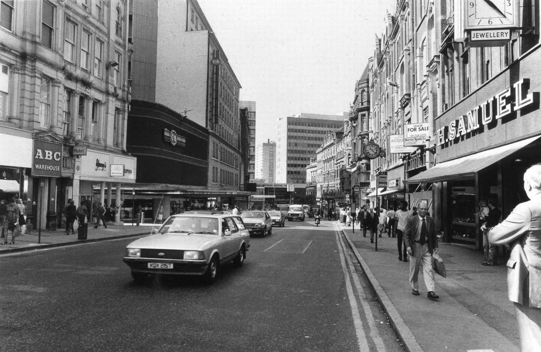 Corporation Street showing some of the shops including C&A, ABC Warehouse and H. Samuel jewellers, 22nd July 1983.