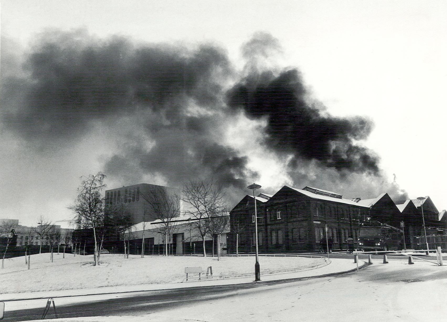 Smoke darkens the wintry scene as fire rages through Bingley Hall, Broad Street, Birmingham 14th January 1984.