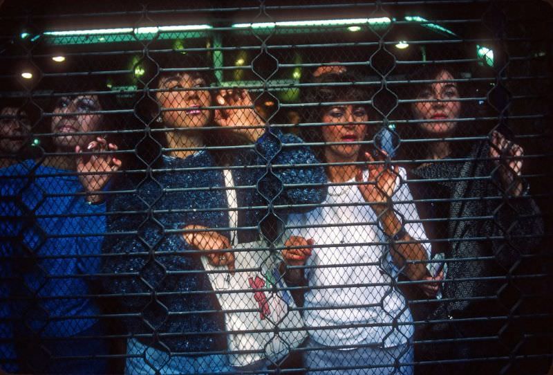 Women watching a violent demo, Santiago, 1988