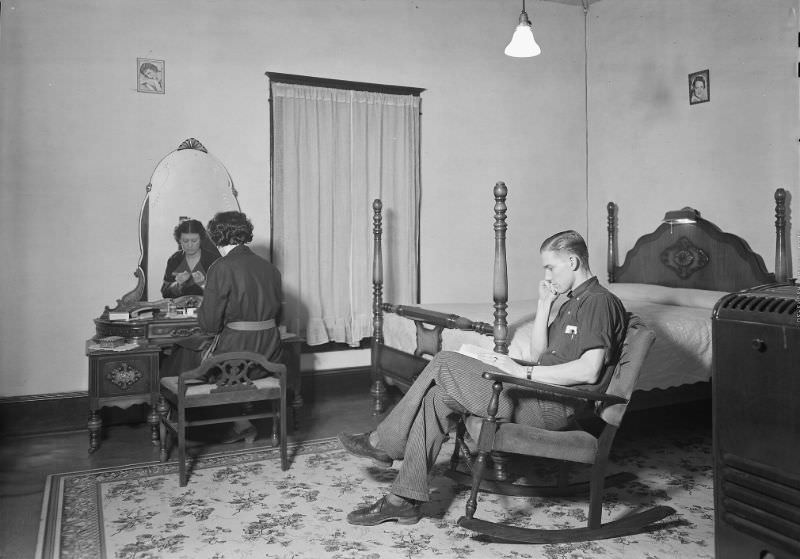 Bedroom and living-room in company-owned home of workers in Highland Cotton Mills, High Point, North Carolina, 1936