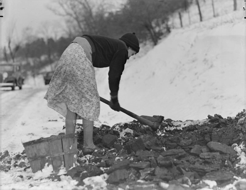 Scott's Run, West Virginia. Woman gathering coal, March 1937