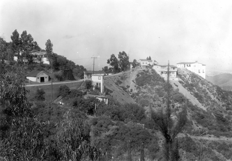 Pacific View Drive, looking west from Viso Drive, retaining wall near the junction with Woodrow Wilson Road, 1925