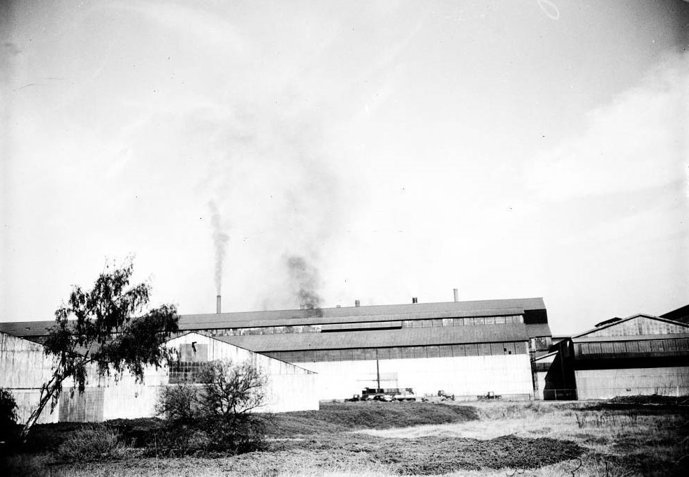 Columbia Steel Company at Torrance, showing smoke coming out of smoke stacks, 1948