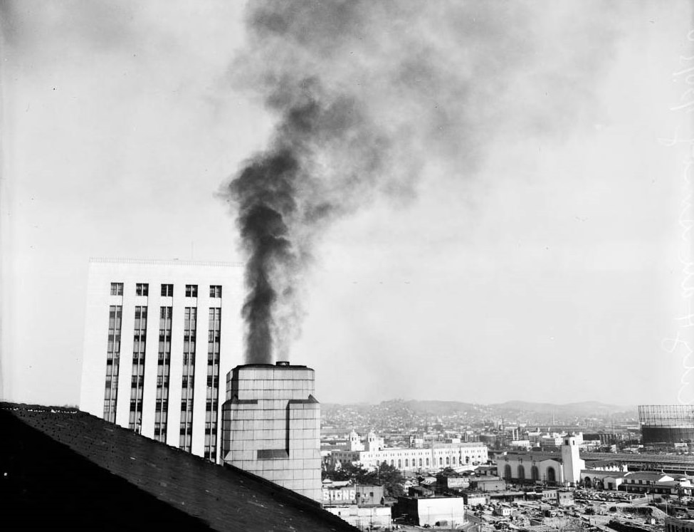 Smoke coming out of stack on 9th floor roof of City Hall, 1950