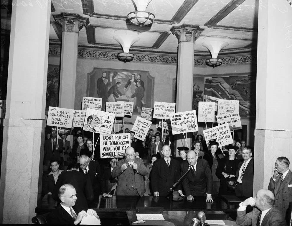 Protestants at Board of Supervisors with plackards, 1947