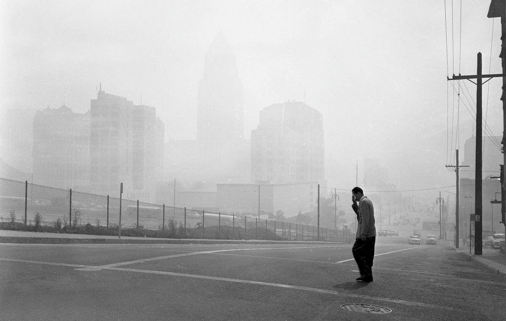 Buildings in Los Angeles Civic Center are barely visible in picture looking east at 1st and Olive Sts. at 11 a.m.