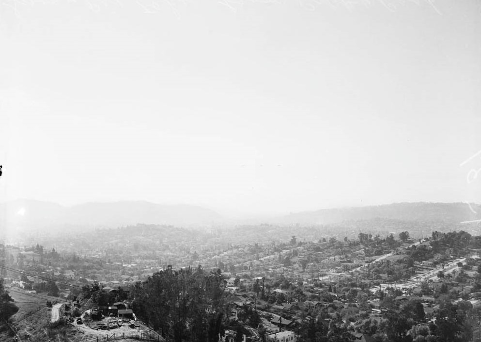 Smog from San Rafael Drive overlooking Highland Park. Smog -- pix looking north from San Rafael Hills showing Mount Wilson, 1949