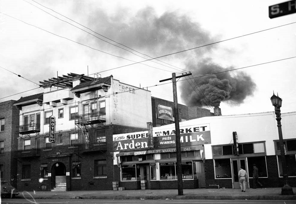 Smoking stack from Mercer Hotel, 1347 South Hill Street, throwing heavy clouds of smoke upward, 10 March 1949
