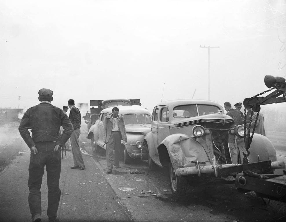 Wrecks caused by smog obscuring road, 1948.