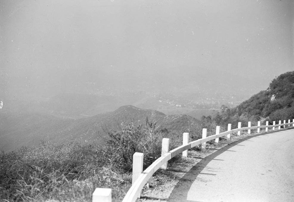 Vine Street and Sunset Boulevard, north toward Hollywood Hills, showing dust, smudge and smog hanging over Hollywood, 1948