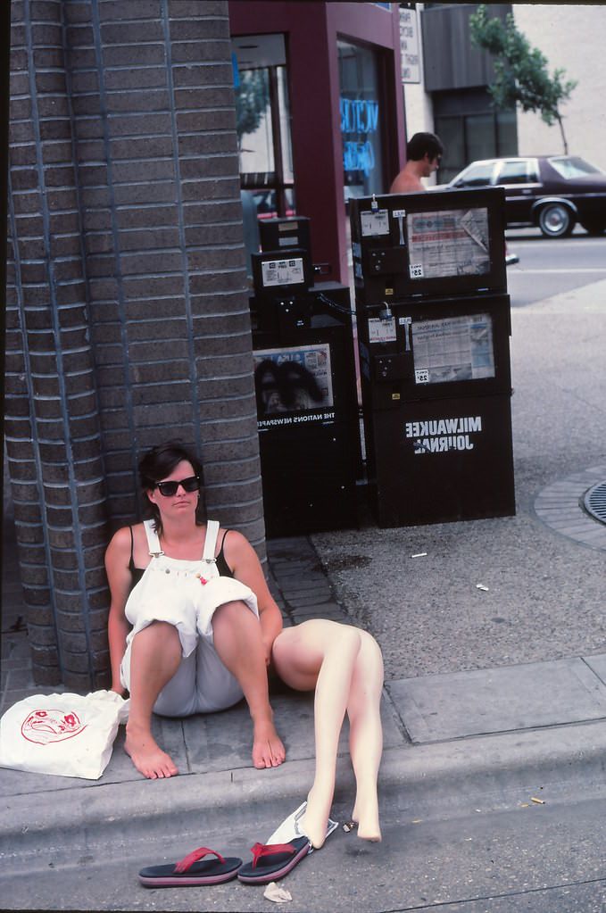 Taking a rest with some spare legs, Maxwell Street Days on State Street