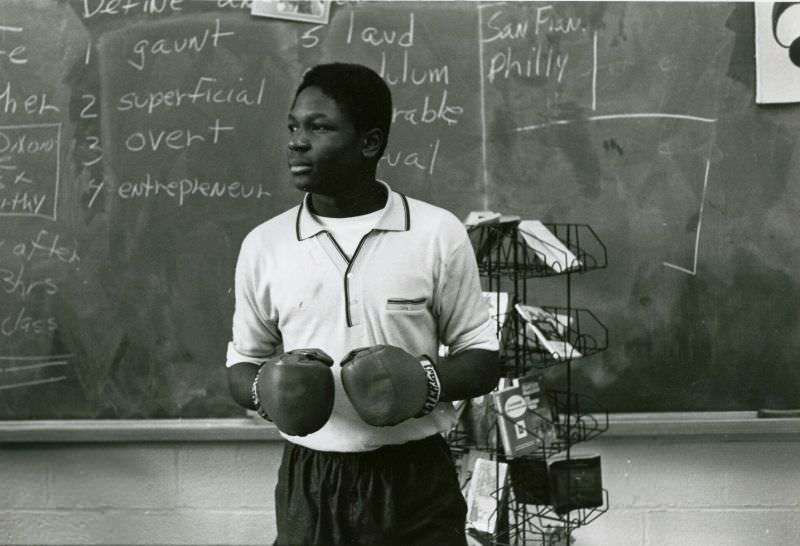 Student in boxing gloves