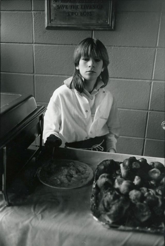 Student working as food server