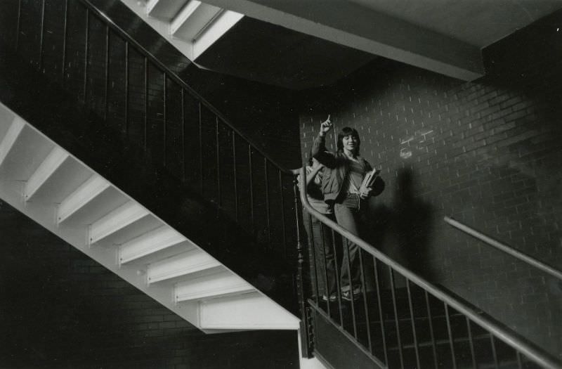 Two students in a stairwell
