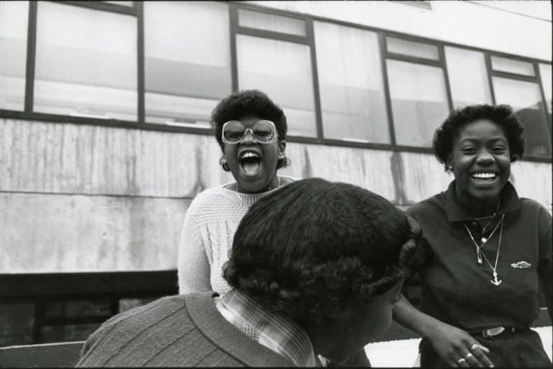 Two students laughing