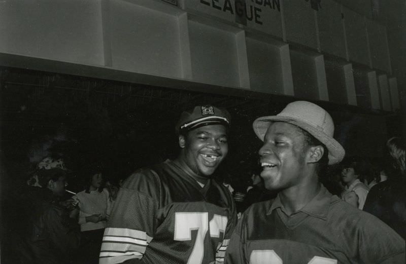 Two students smiling